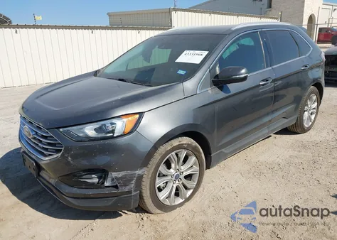 2020 Ford Edge Titanium z USA, uszkodzony, nr VIN 2FMPK3K9XLBA98670